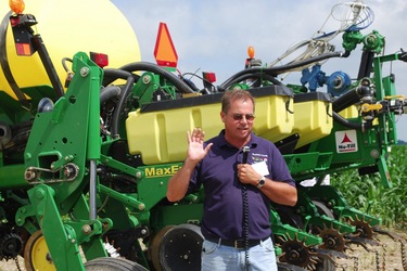 Mike Starkey, Brownsburg, IN, describes his no-till planter set up at the Indiana Farm Management Tour organized by Purdue Department of Agricultural Economics which made a stop at his farm on June 24. 